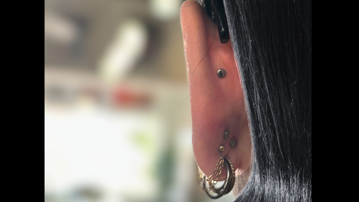 A fully healed cartilage piercing with flat, settled tissue