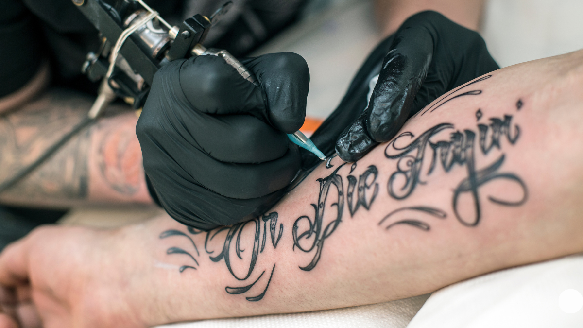 script tattoo showing varied stroke weight in the lettering